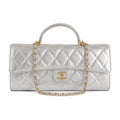 Chanel CC Quilted Cylindrical Flap Bag | Silver Metallic & Gold — 25cm