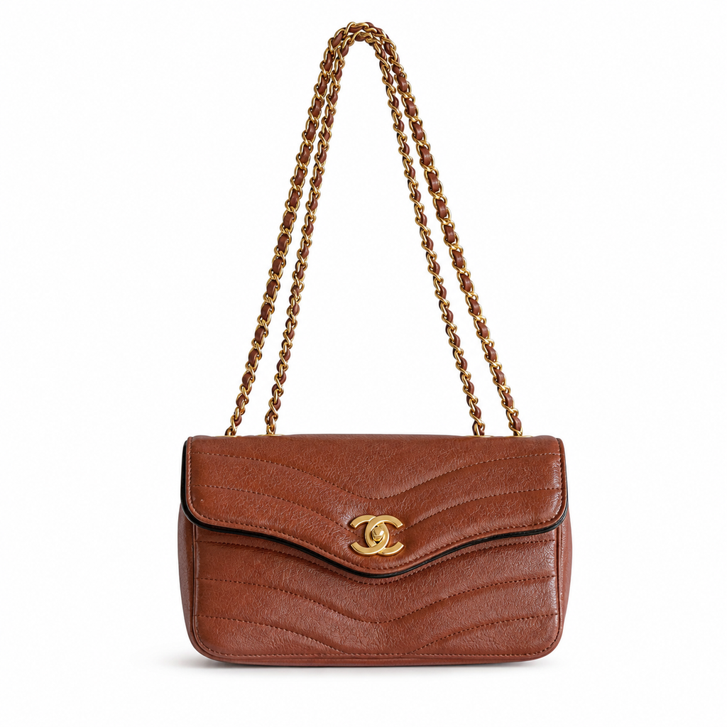 Chanel Wave-Quilted Mini Flap Cognac Lambskin | Gold Push-Lock & Burgundy Interior — 27cm